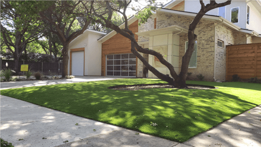 home with artificial turf outside