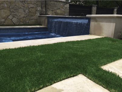 synthetic grass with a pool